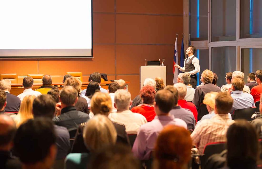 Presenter Clicking through slides at Merck