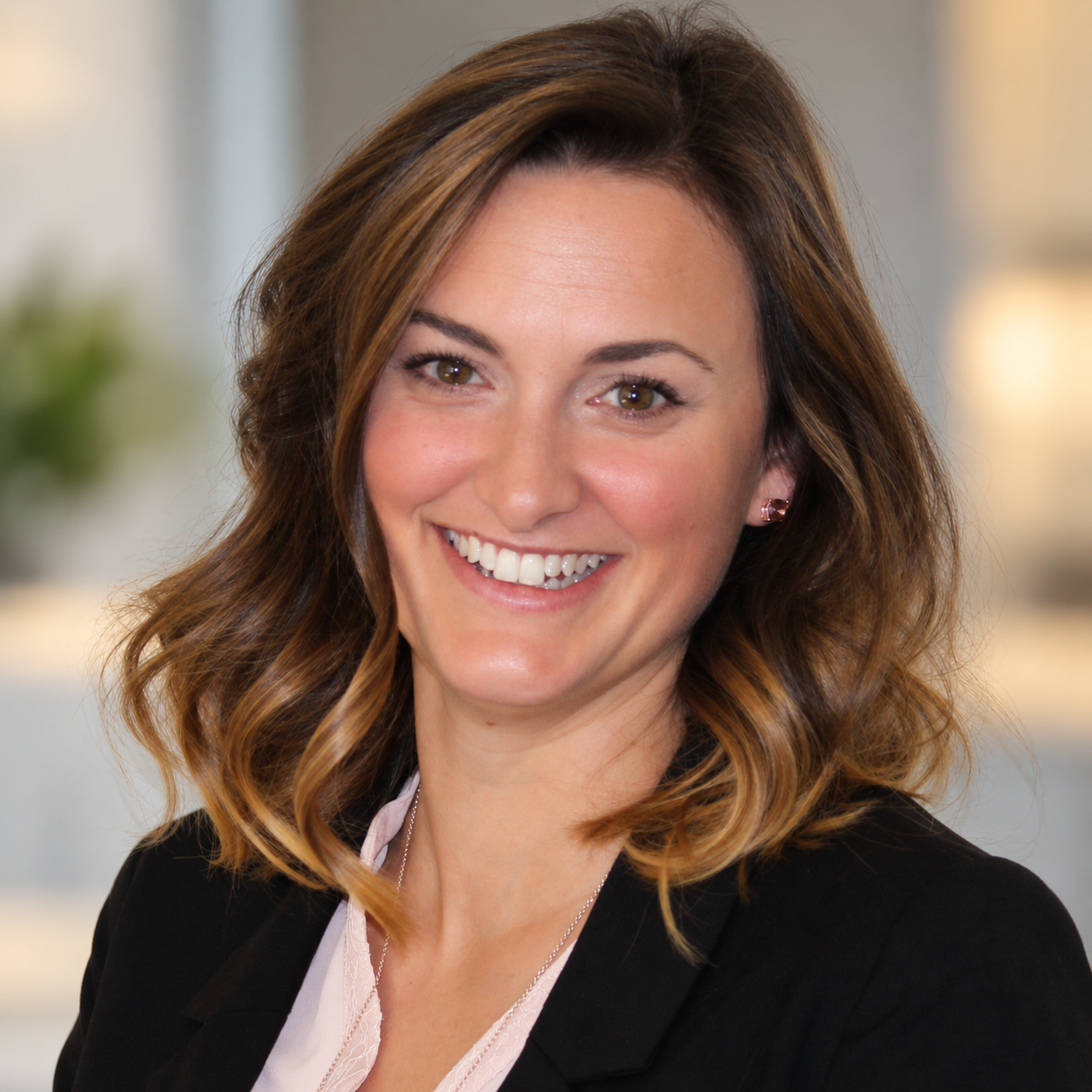 Polished Corporate Portrait with Warm Office Bokeh